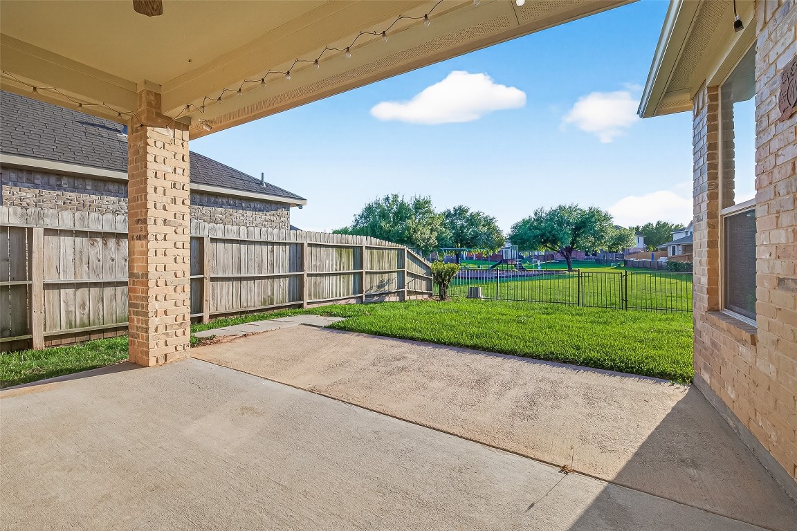 2019 Preston Park Rosenberg, TX 77471 - Photo 25 of 36 Extended Concrete Patio