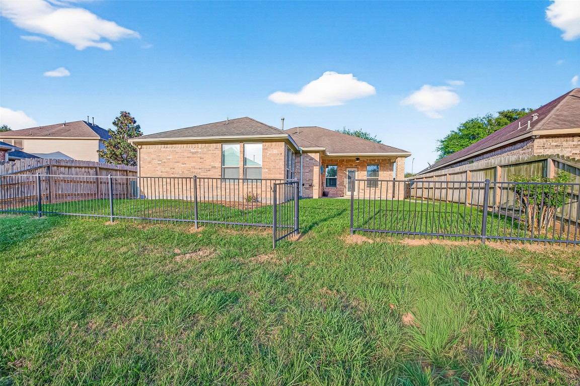 2019 Preston Park Rosenberg, TX 77471 - Photo 28 of 36 Back Yard Fenced with Access to Playground