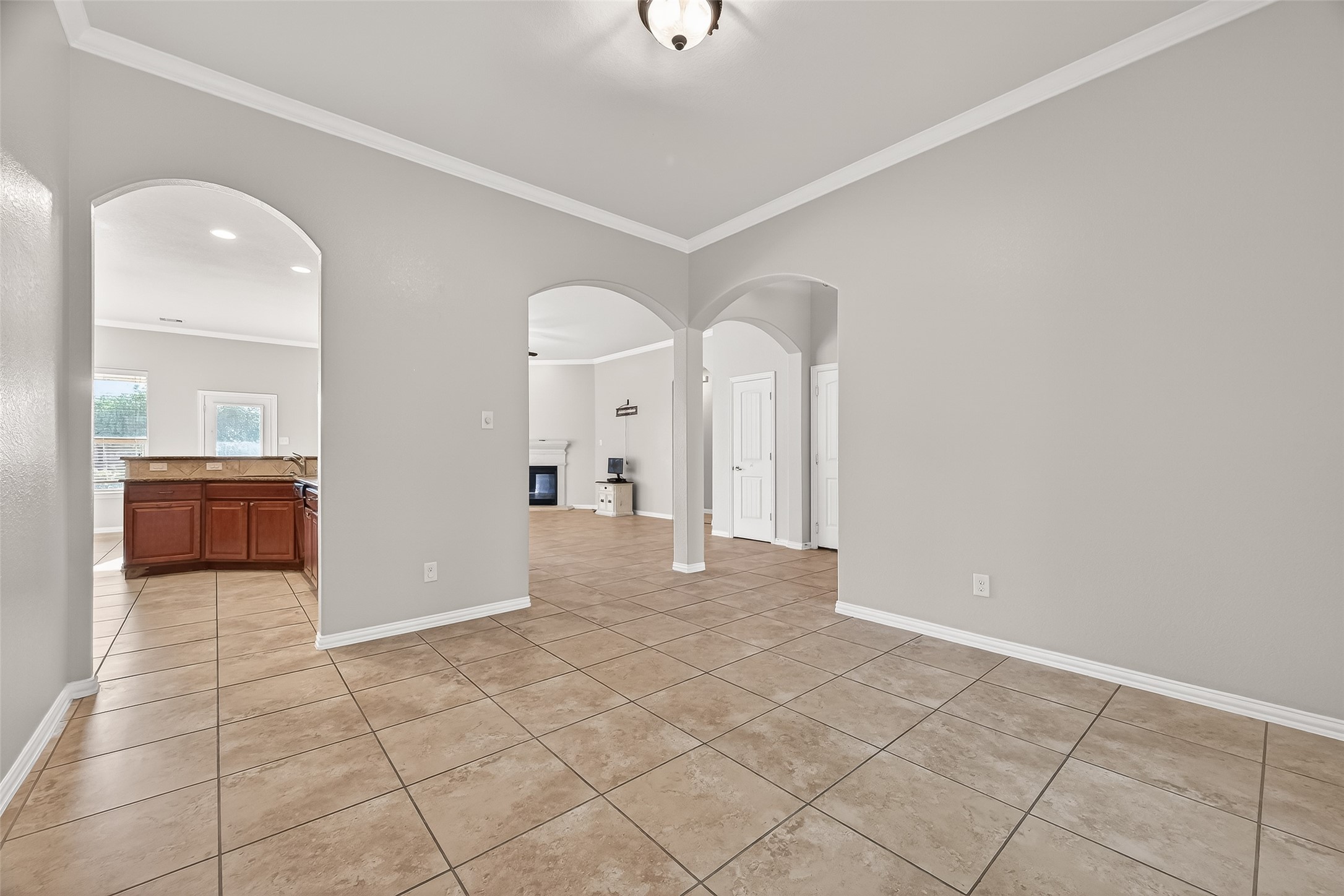 2019 Preston Park Rosenberg, TX 77471 - Photo 4 of 36 View from Formal Dining Toward Kitchen / Living