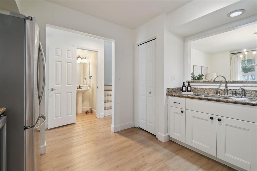 4835 West Flamingo Road Tampa, FL 33611 - Photo 15 of 51 a bathroom with a sink and a mirror