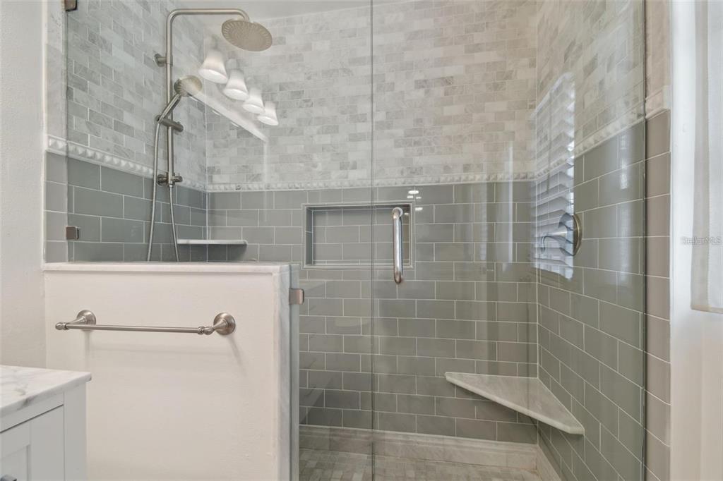 4835 West Flamingo Road Tampa, FL 33611 - Photo 25 of 51 a bathroom with a shower