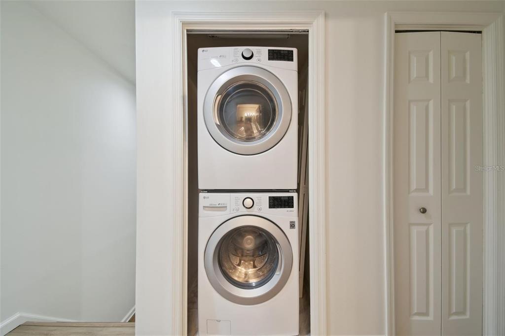 4835 West Flamingo Road Tampa, FL 33611 - Photo 34 of 51 a view of a hallway with washer and dryer