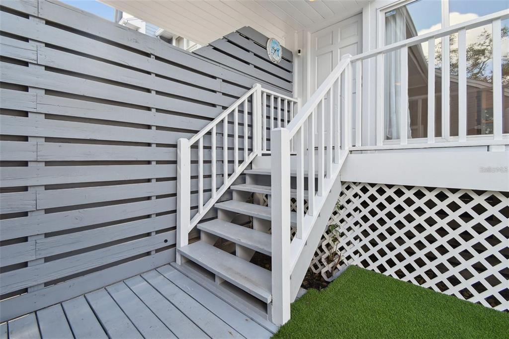 4835 West Flamingo Road Tampa, FL 33611 - Photo 37 of 51 a view of entryway with wooden floor