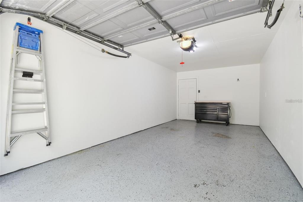 4835 West Flamingo Road Tampa, FL 33611 - Photo 40 of 51 a view of a livingroom with toys