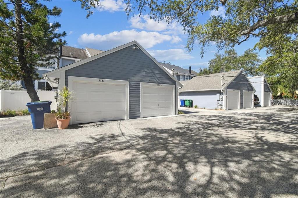 4835 West Flamingo Road Tampa, FL 33611 - Photo 41 of 51 a view of a house with a yard