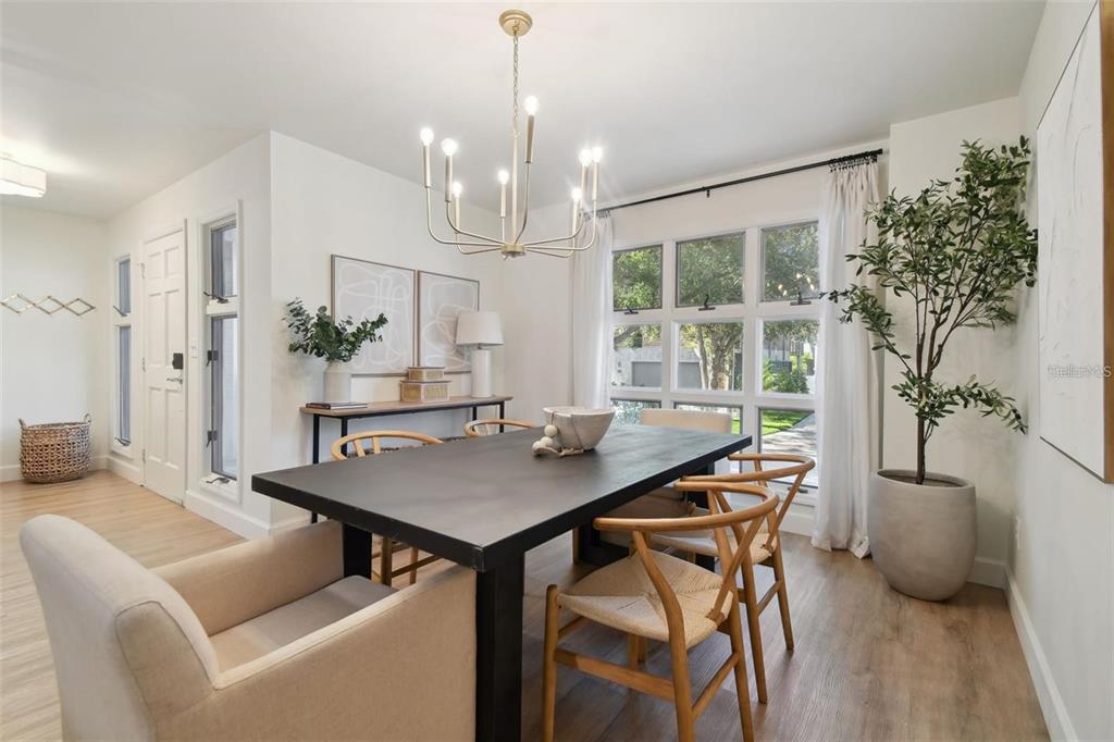 4835 West Flamingo Road Tampa, FL 33611 - Photo 6 of 51 a view of a dining room with furniture window and outside view