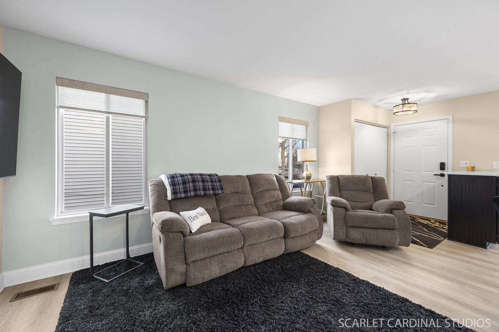 2828 Bluewater Circle Naperville, IL 60564 - Photo 9 of 17 a living room with furniture and a window