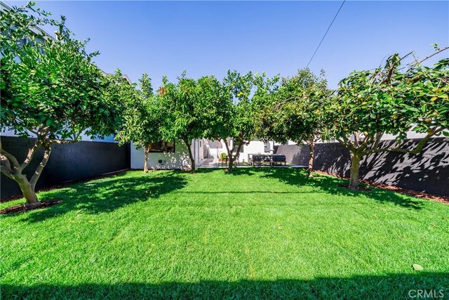 a view of a backyard with a garden