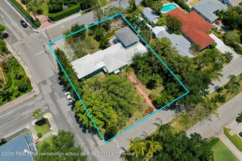 an aerial view of house with yard