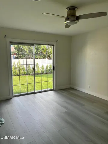 a view of a room with natural light
