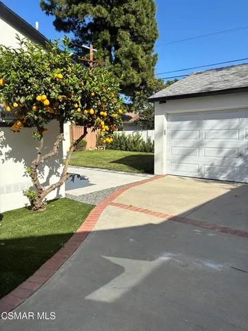 a view of backyard with green space