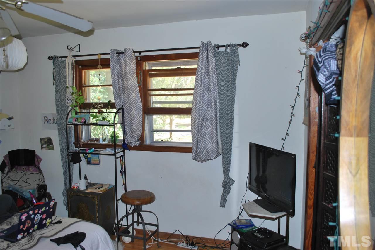 111 Weston Road Garner, NC 27529 - Photo 8 of 10 a view of a workspace with furniture and a window