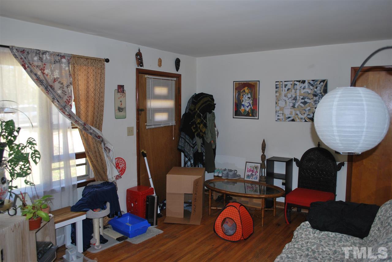 111 Weston Road Garner, NC 27529 - Photo 9 of 10 a living room with furniture and a mirror