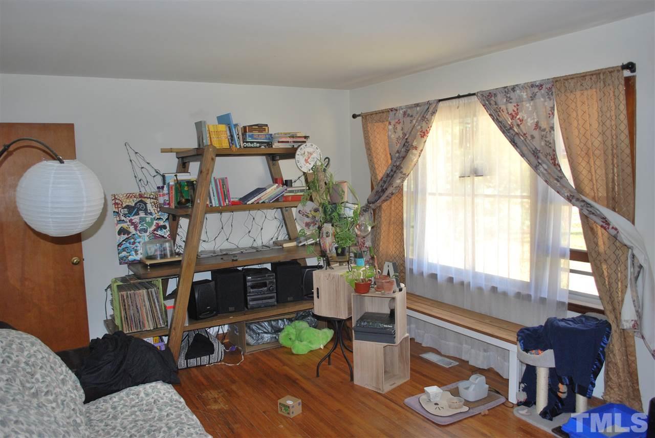 111 Weston Road Garner, NC 27529 - Photo 10 of 10 a living room with furniture and a fireplace
