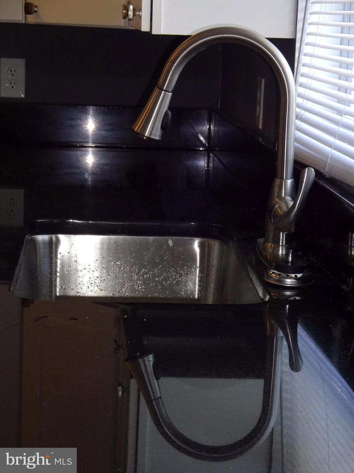 11 Torque Way Baltimore, MD 21220 - Photo 8 of 20 Granite Counters and Stainless Sink