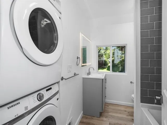 a utility room with dryer and washer