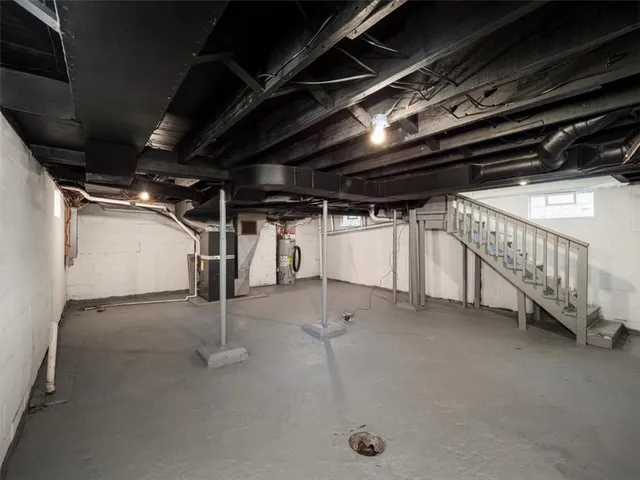 a view of an empty room with stairs