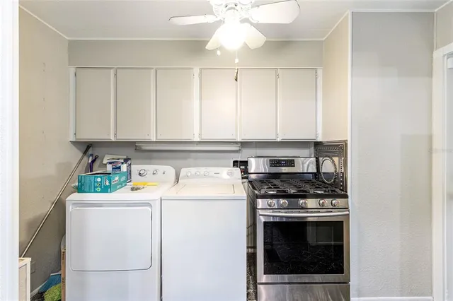 a spacious bathroom with a shower sink and mirror