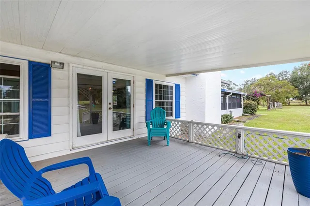 a view of a swimming pool with a patio