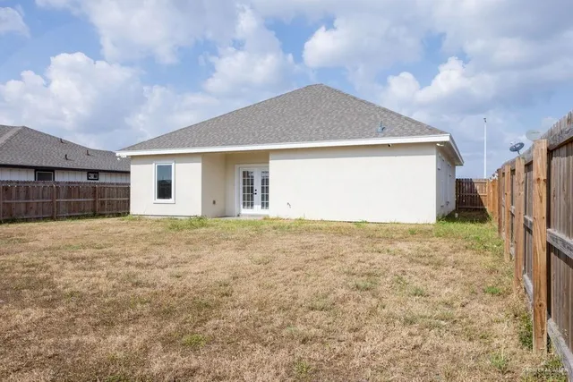 a front view of house with garage