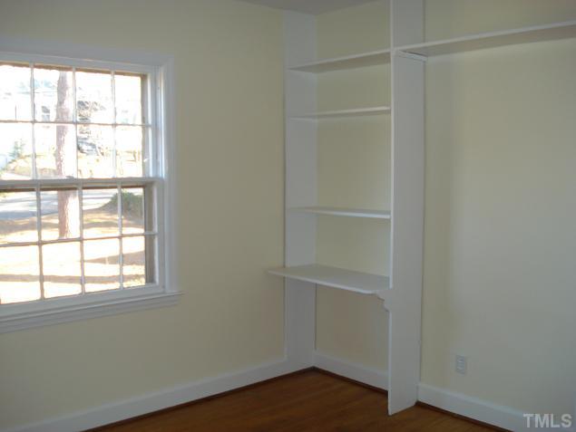 3011 Mayview Road Raleigh, NC 27607 - Photo 9 of 12 The second bedroom measures 11.3x10 and has built-in bookshelves.