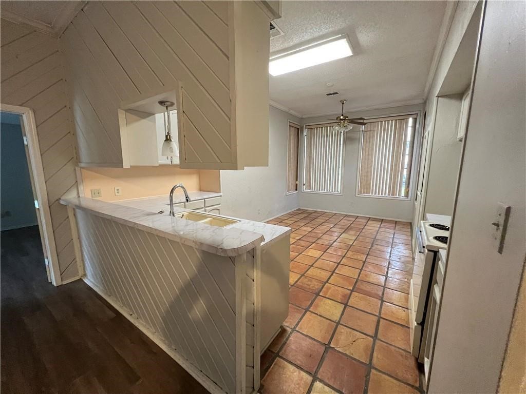 7309 Ridge Creek Drive Corpus Christi, TX 78413 - Photo 3 of 6 a bathroom with a sink a mirror and shower