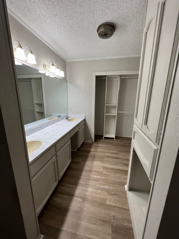 7309 Ridge Creek Drive Corpus Christi, TX 78413 - Photo 5 of 6 a bathroom with a sink a mirror and a shower