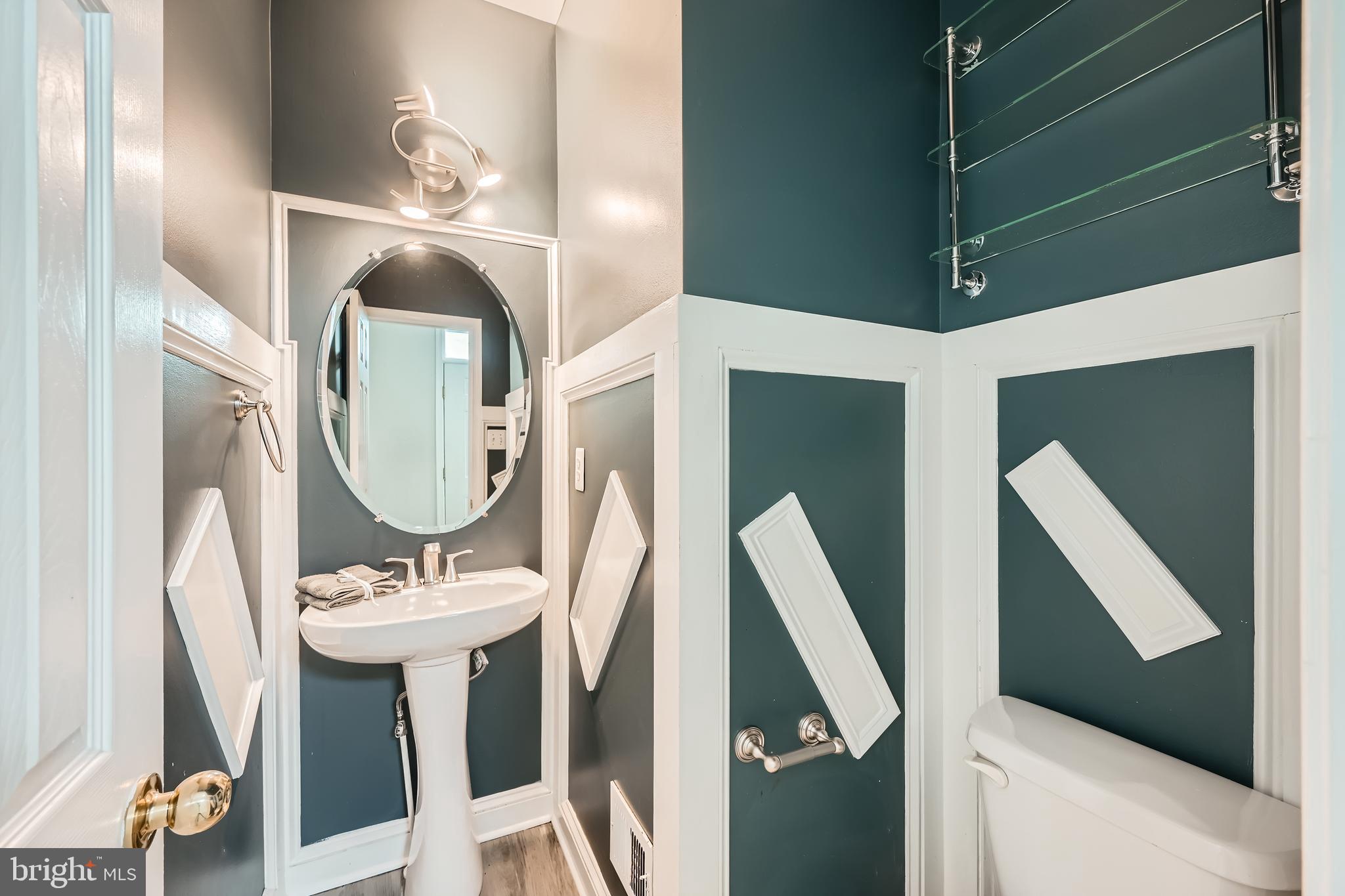 9655 Davison Road Middle River, MD 21220 - Photo 19 of 43 a bathroom with a sink and a mirror