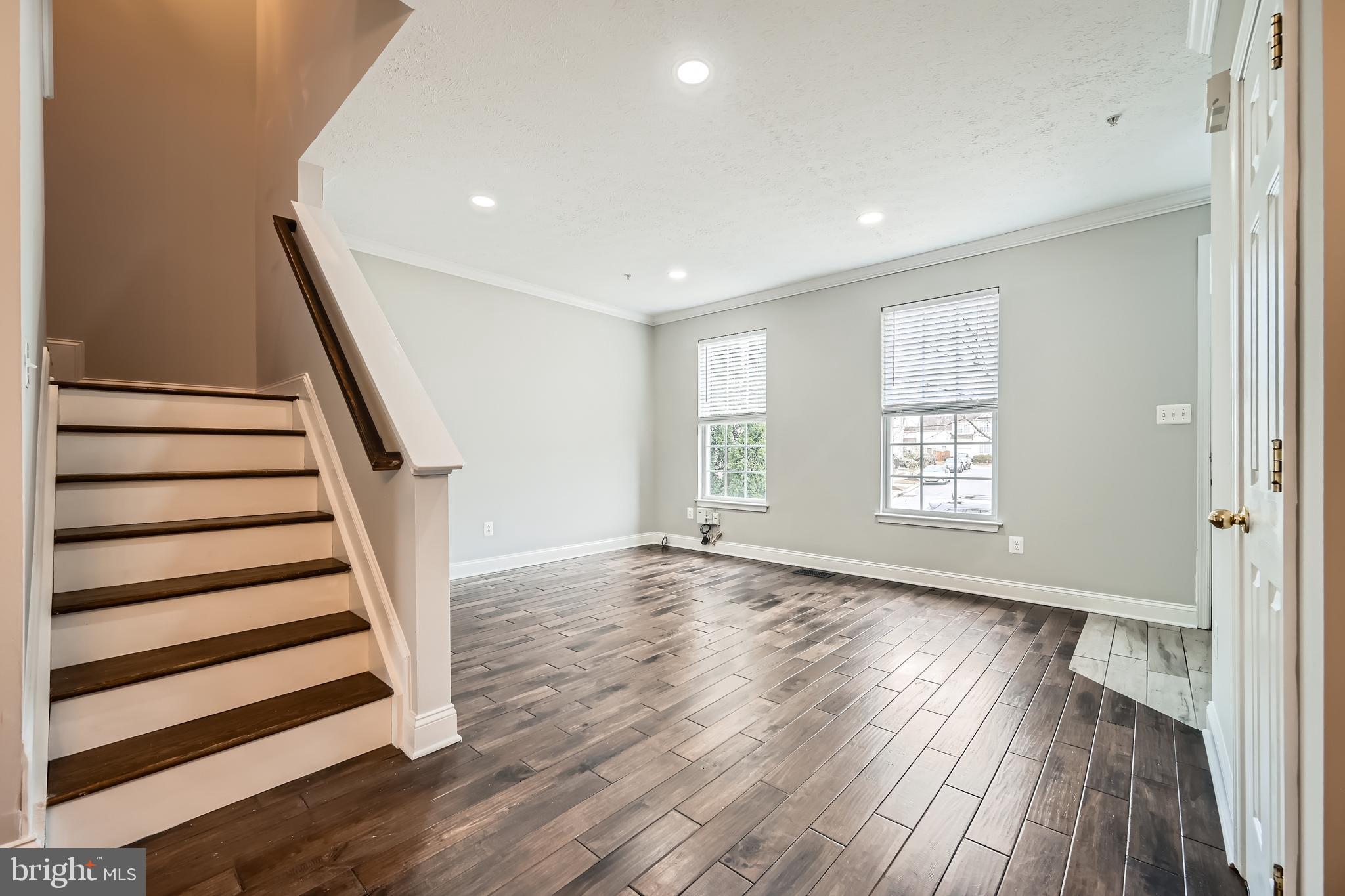 9655 Davison Road Middle River, MD 21220 - Photo 21 of 43 a view of entryway with wooden floor and stairs
