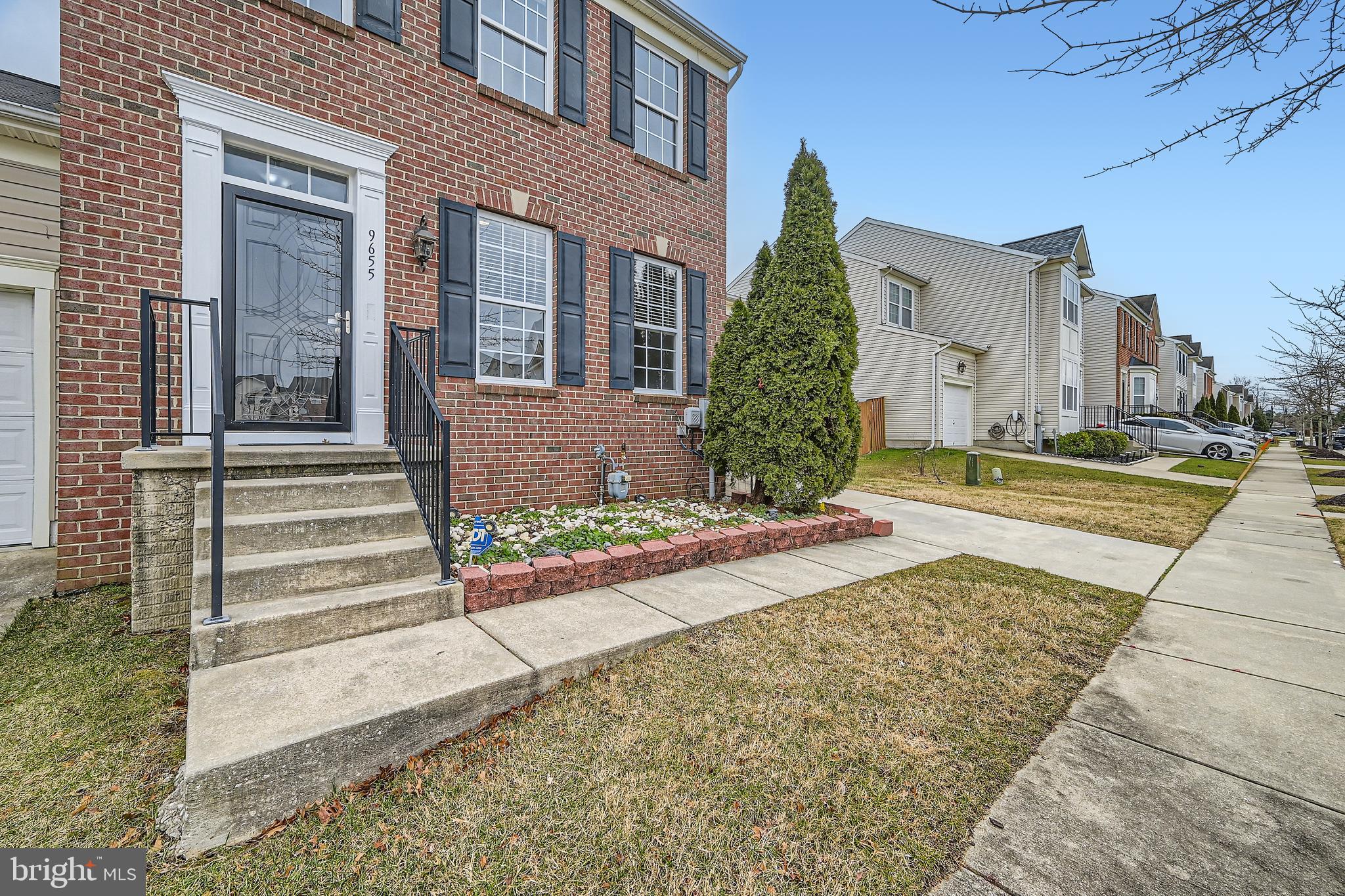 9655 Davison Road Middle River, MD 21220 - Photo 3 of 43 a view of a brick house with potted plants