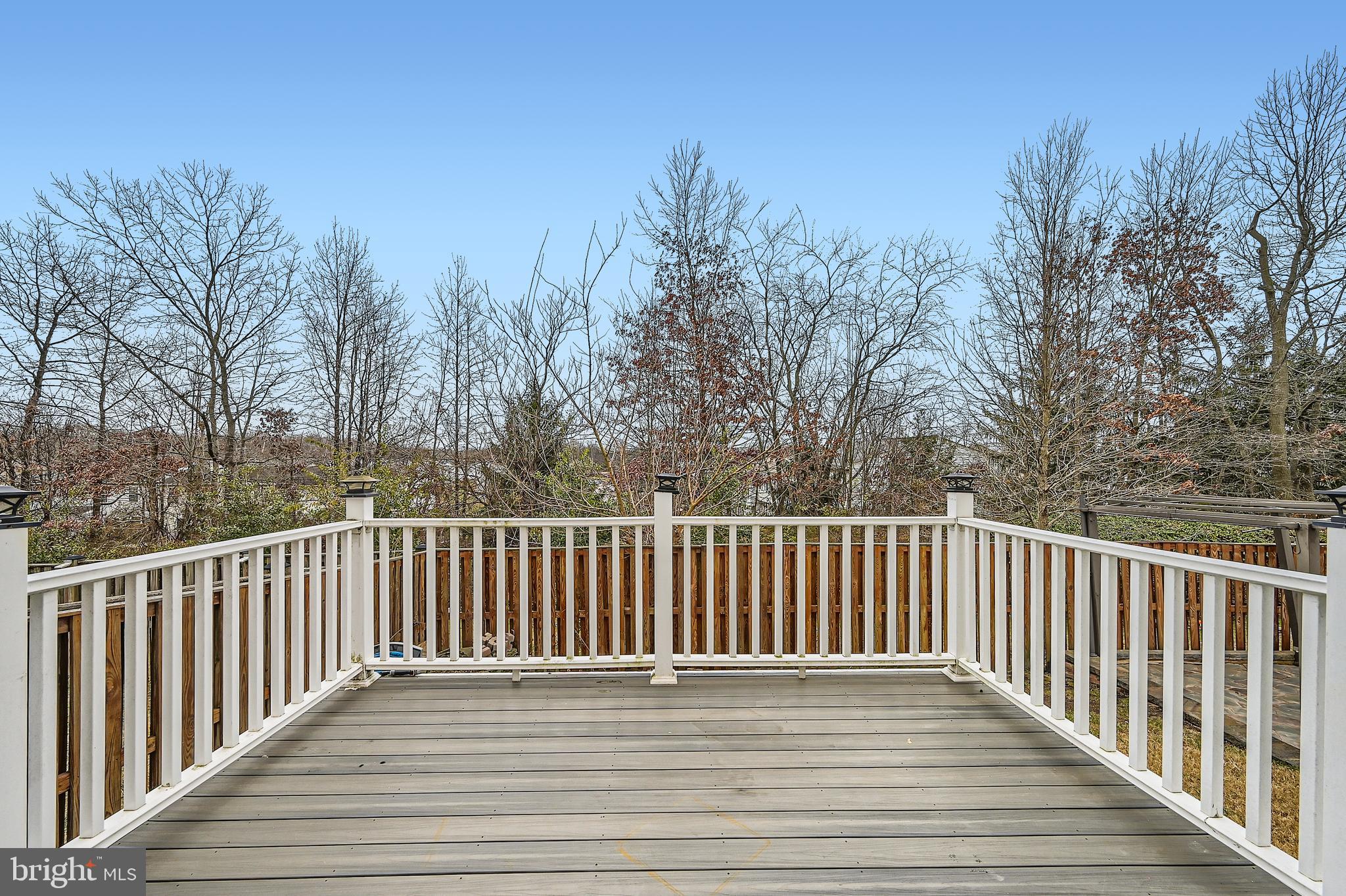 9655 Davison Road Middle River, MD 21220 - Photo 41 of 43 a view of wooden deck and trees with wooden fence