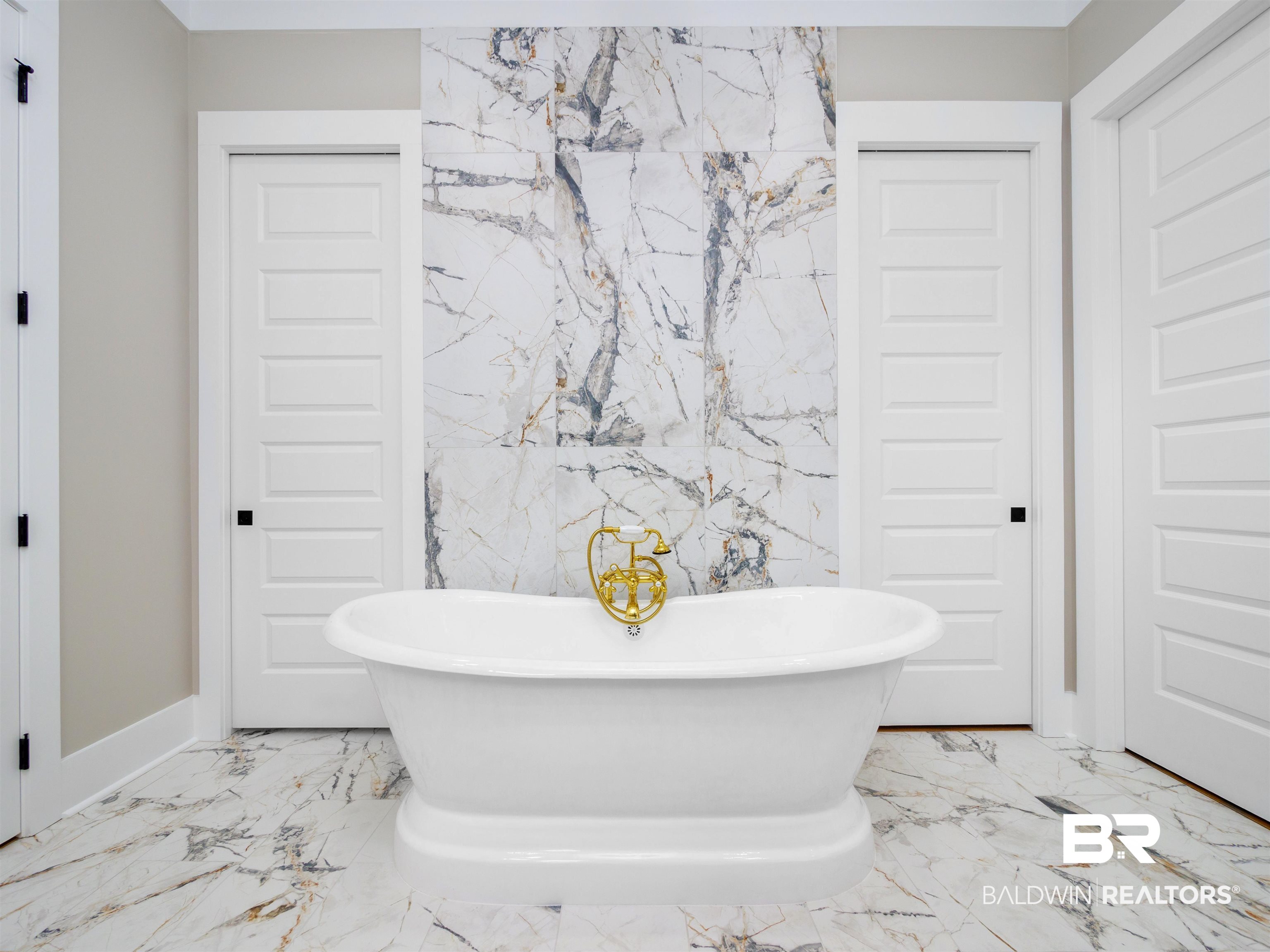10970 Turin Avenue Fairhope, AL 36532 - Photo 18 of 61 Primary bath with cast iron tub and beautiful tile