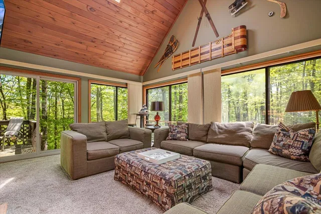 a kitchen with stainless steel appliances granite countertop a stove and cabinets