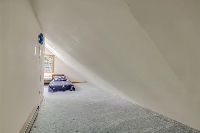 a view of a lake with a yard