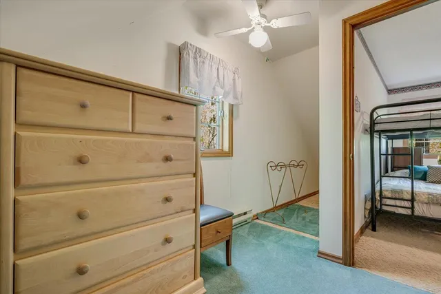 a view of yard with trees in the background