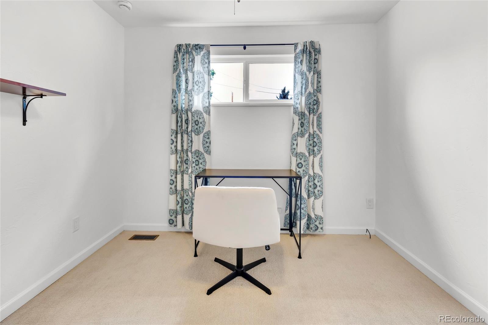 3746 Yates Street Denver, CO 80212 - Photo 11 of 21 a view of workspace with window