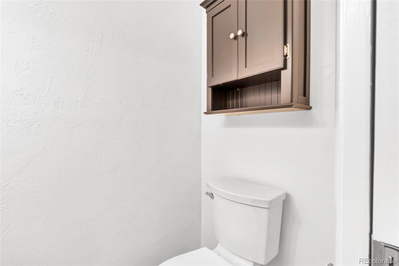 3746 Yates Street Denver, CO 80212 - Photo 15 of 21 a bathroom with a toilet