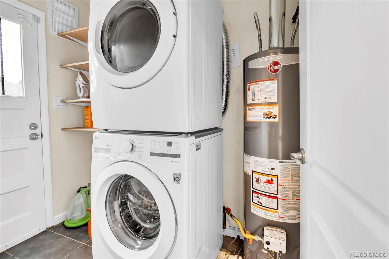 3746 Yates Street Denver, CO 80212 - Photo 16 of 21 a utility room with dryer and washer