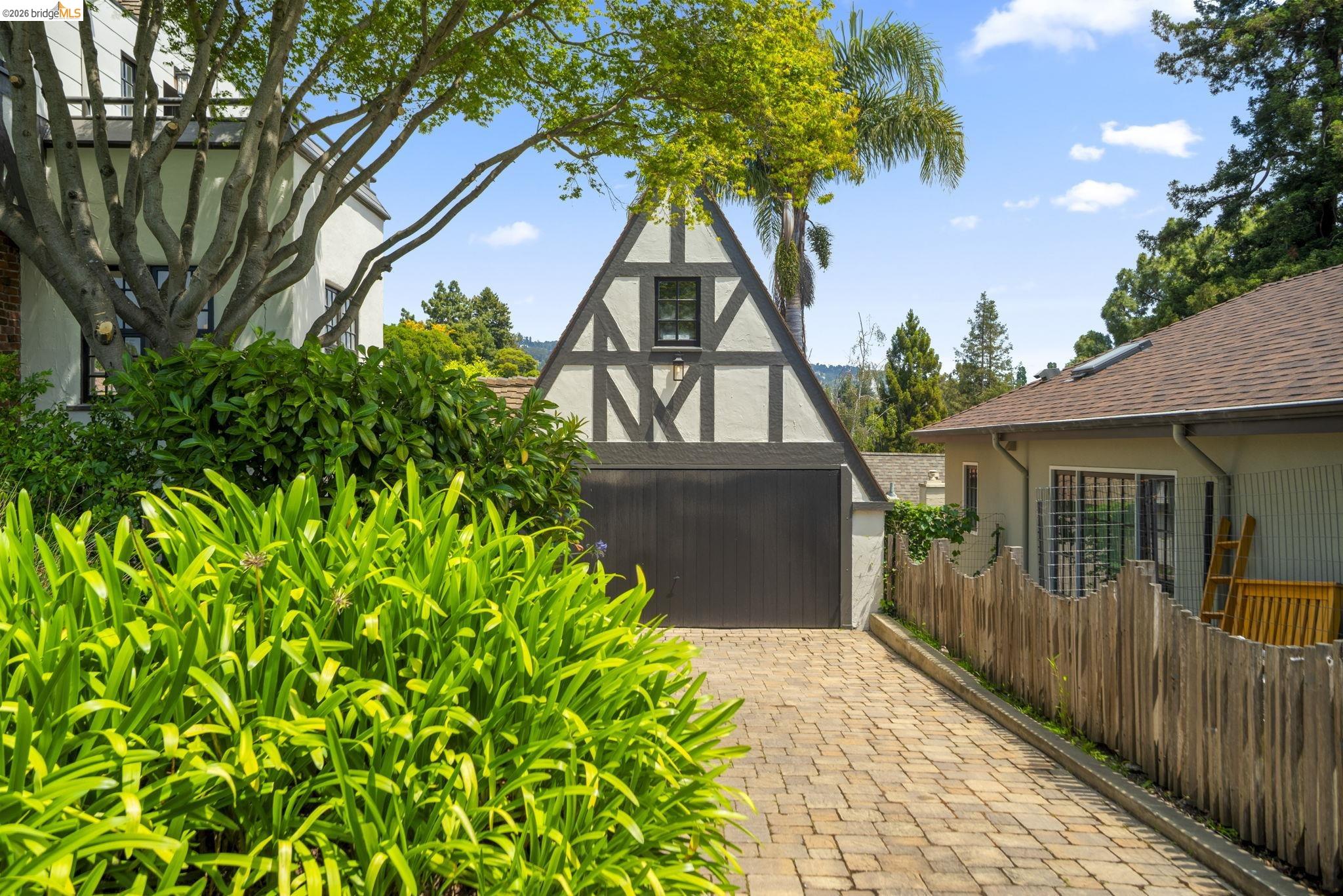 1087 Hubert Road Oakland, CA 94610 - Photo 41 of 67 Tudor-style exterior with dark trim detailing