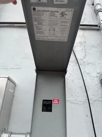 a bedroom with a bed and a mirror