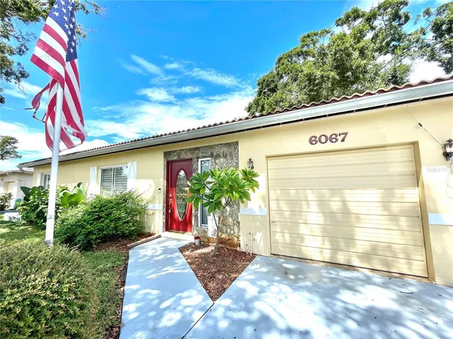 a view of the entrance gate of the house