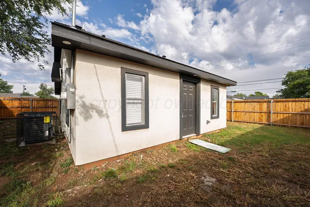 a view of backyard of house