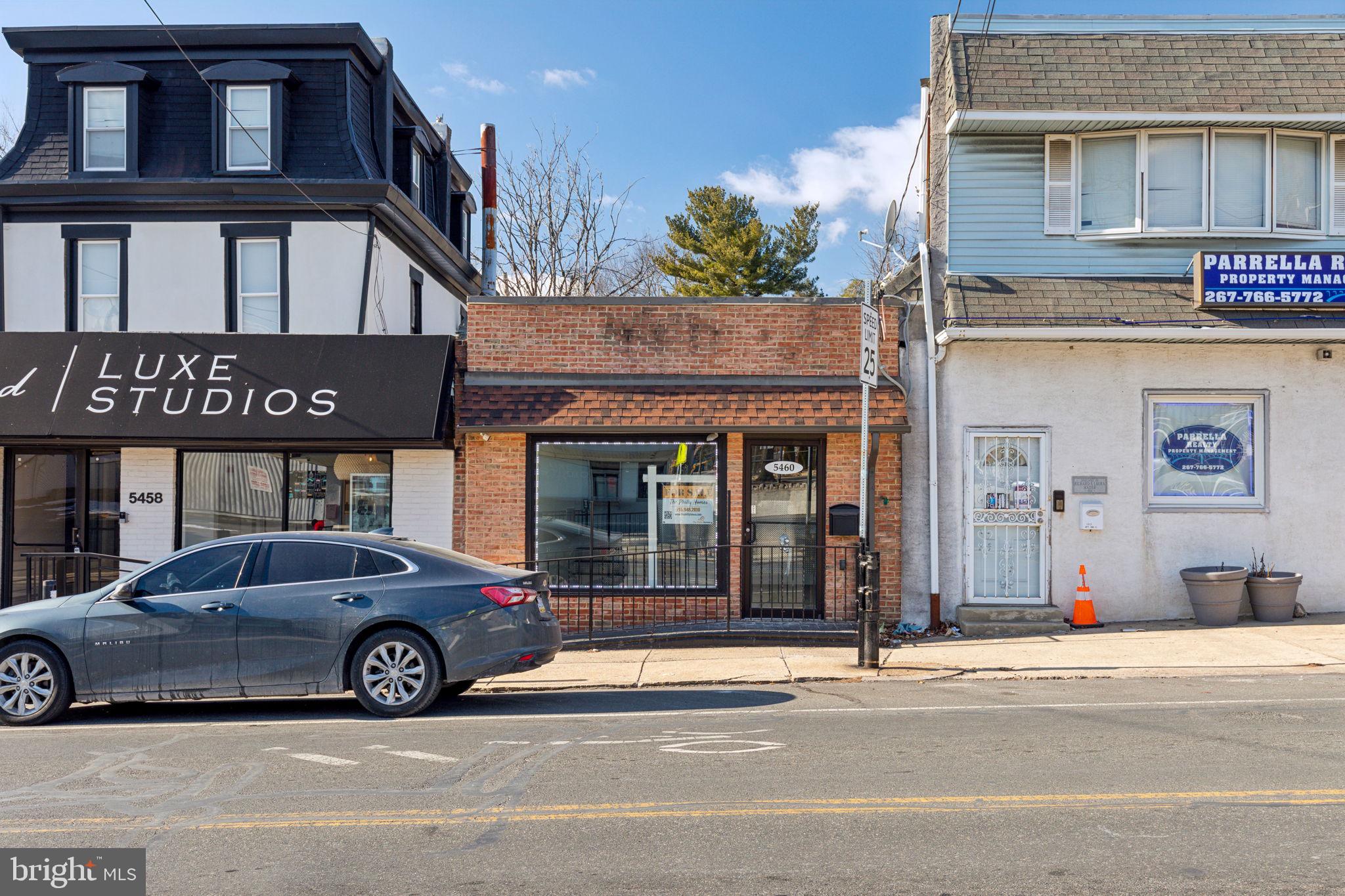 5460 Ridge Avenue Philadelphia, PA 19128 - Photo 1 of 26 a car parked in front of a building