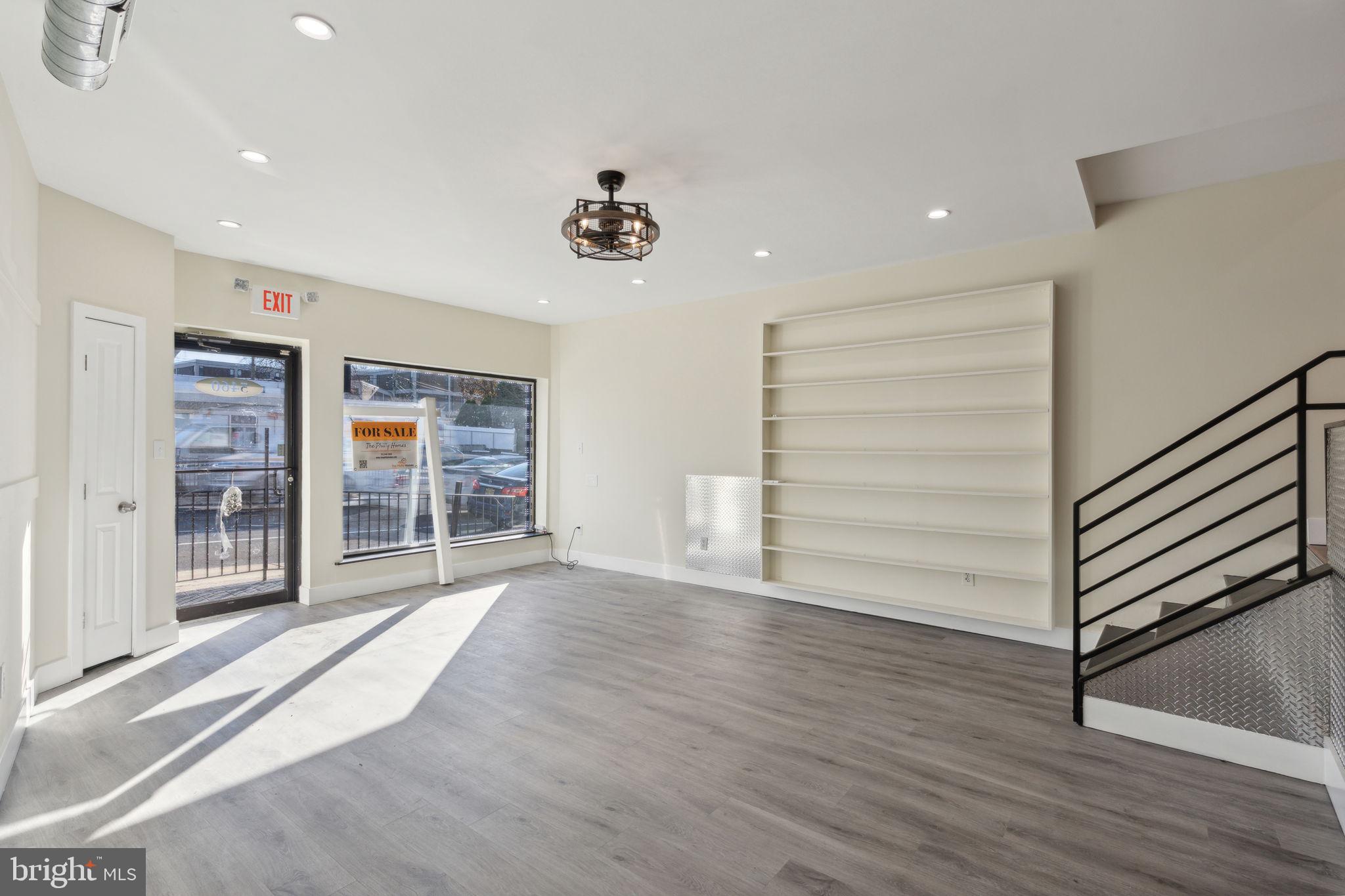 5460 Ridge Avenue Philadelphia, PA 19128 - Photo 12 of 26 an empty room with wooden floor closet and windows
