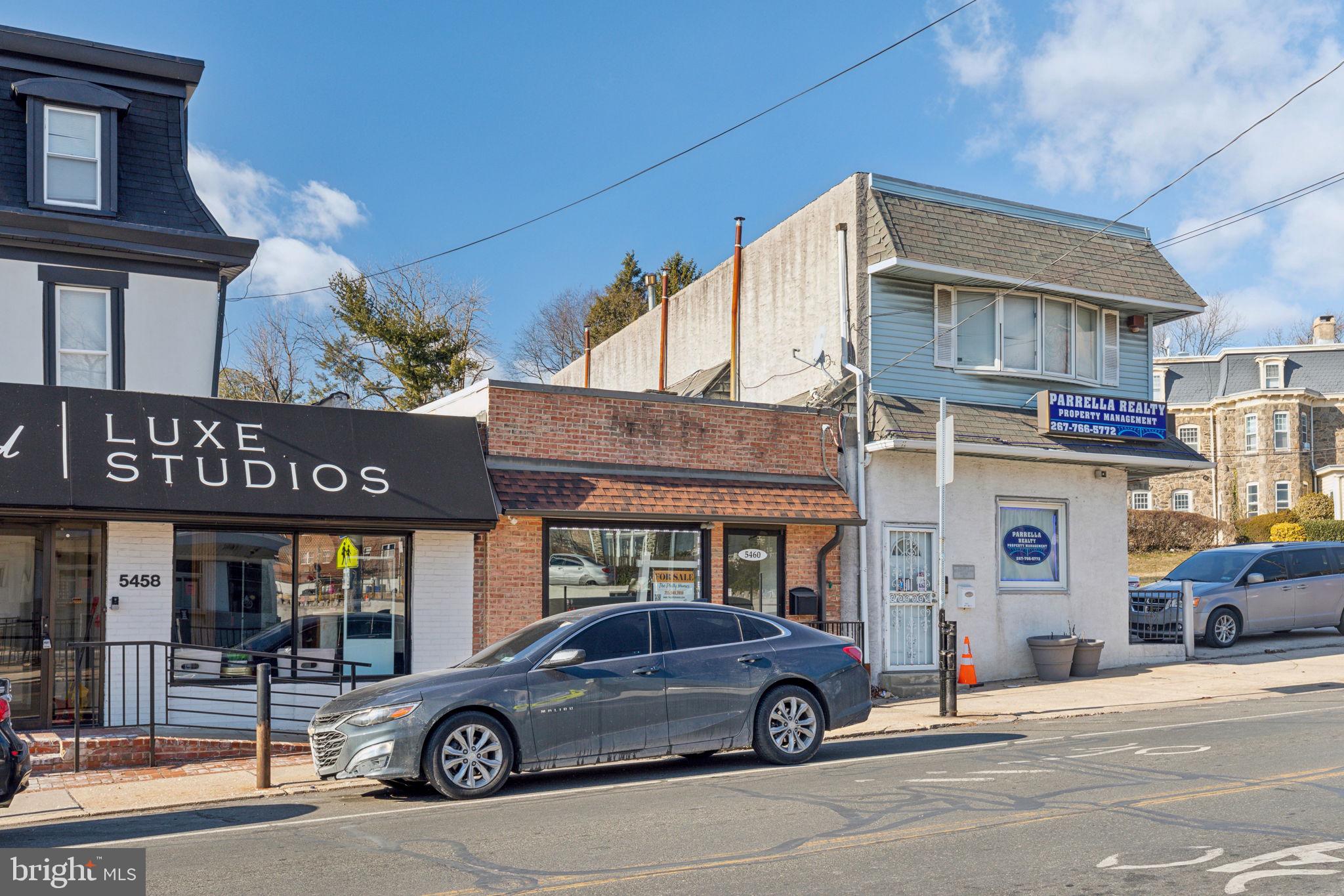5460 Ridge Avenue Philadelphia, PA 19128 - Photo 2 of 26 a car parked in front of a building