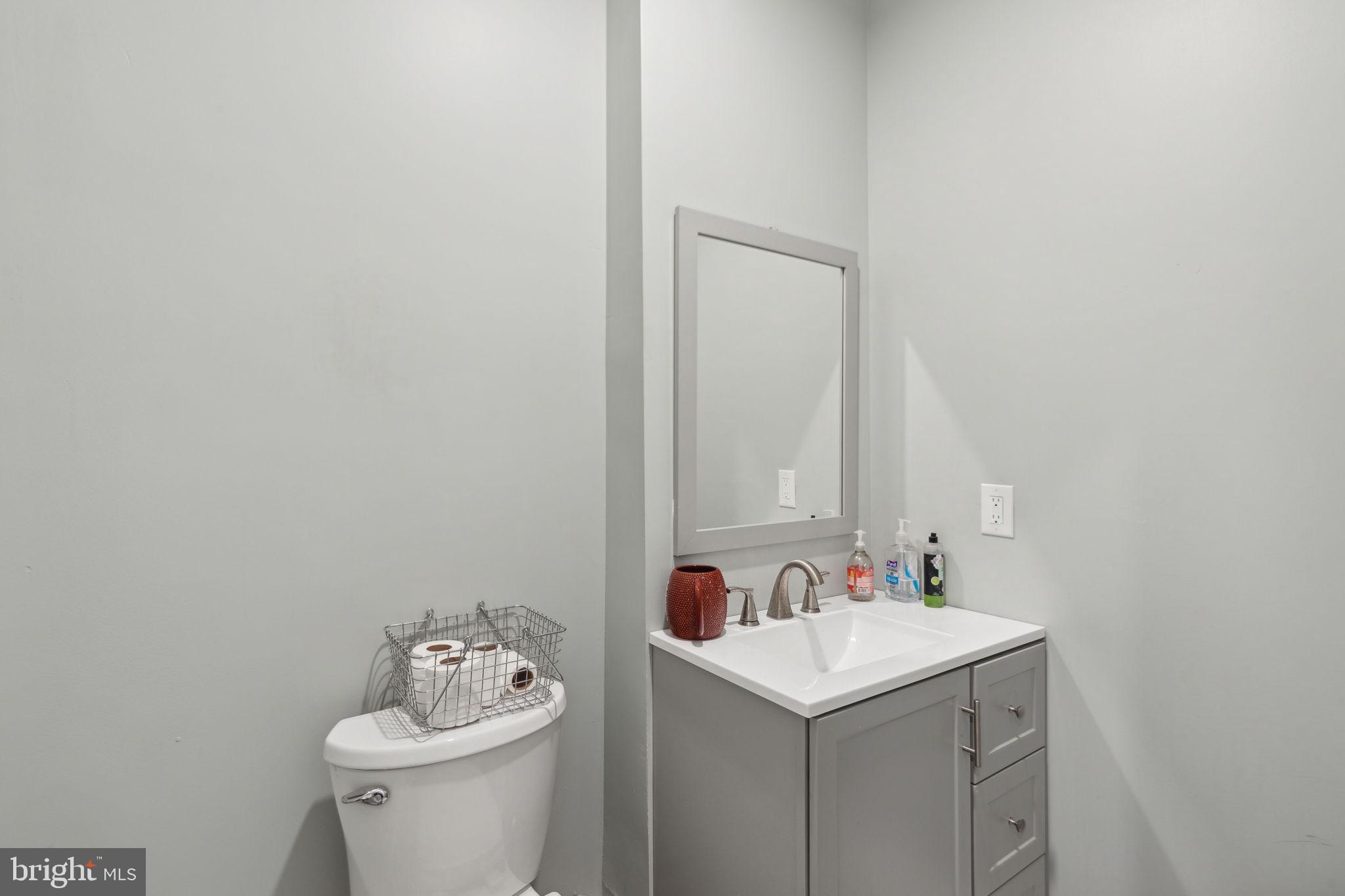 5460 Ridge Avenue Philadelphia, PA 19128 - Photo 26 of 26 a bathroom with a sink and a toilet