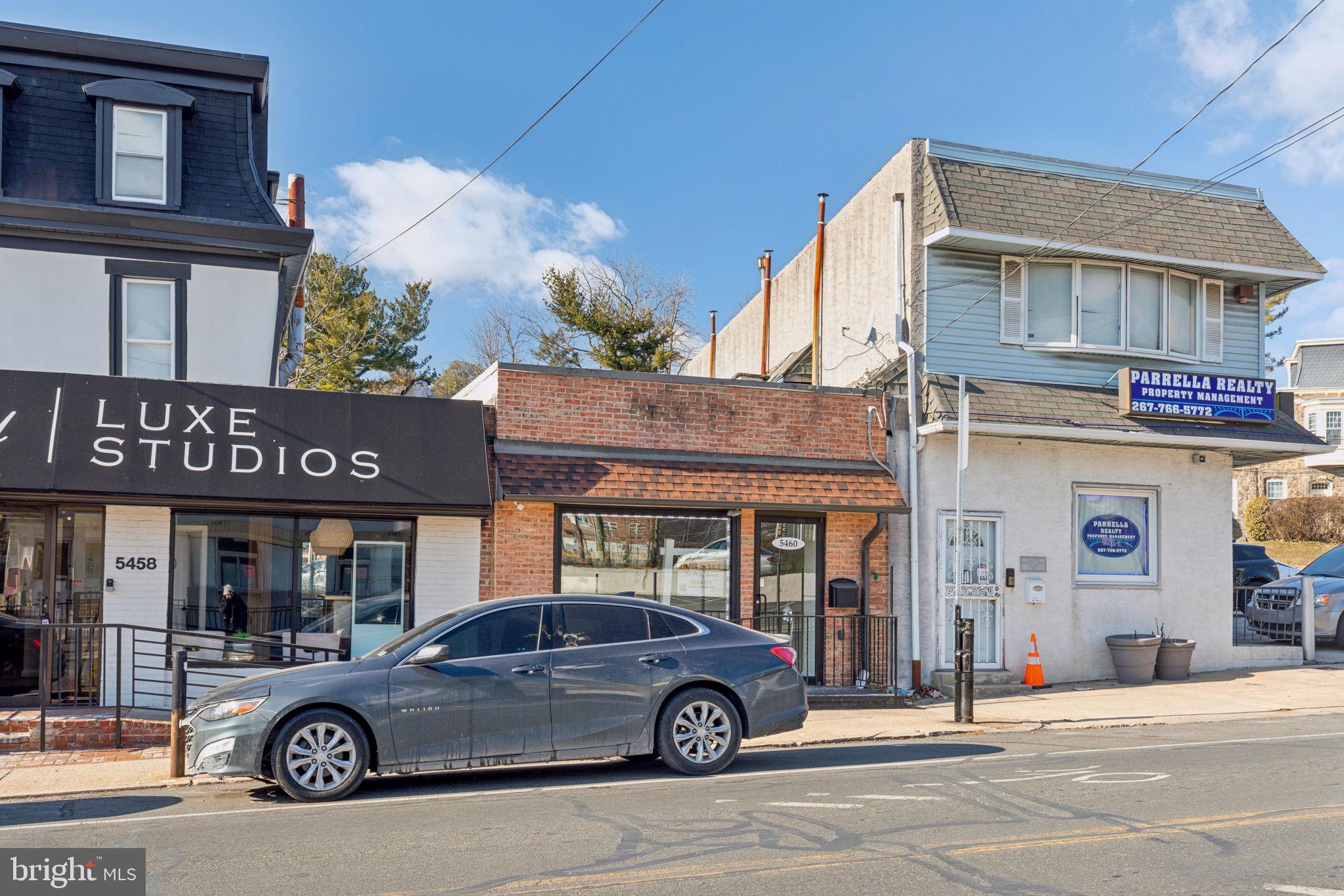 5460 Ridge Avenue Philadelphia, PA 19128 - Photo 3 of 26 a car parked in front of a building