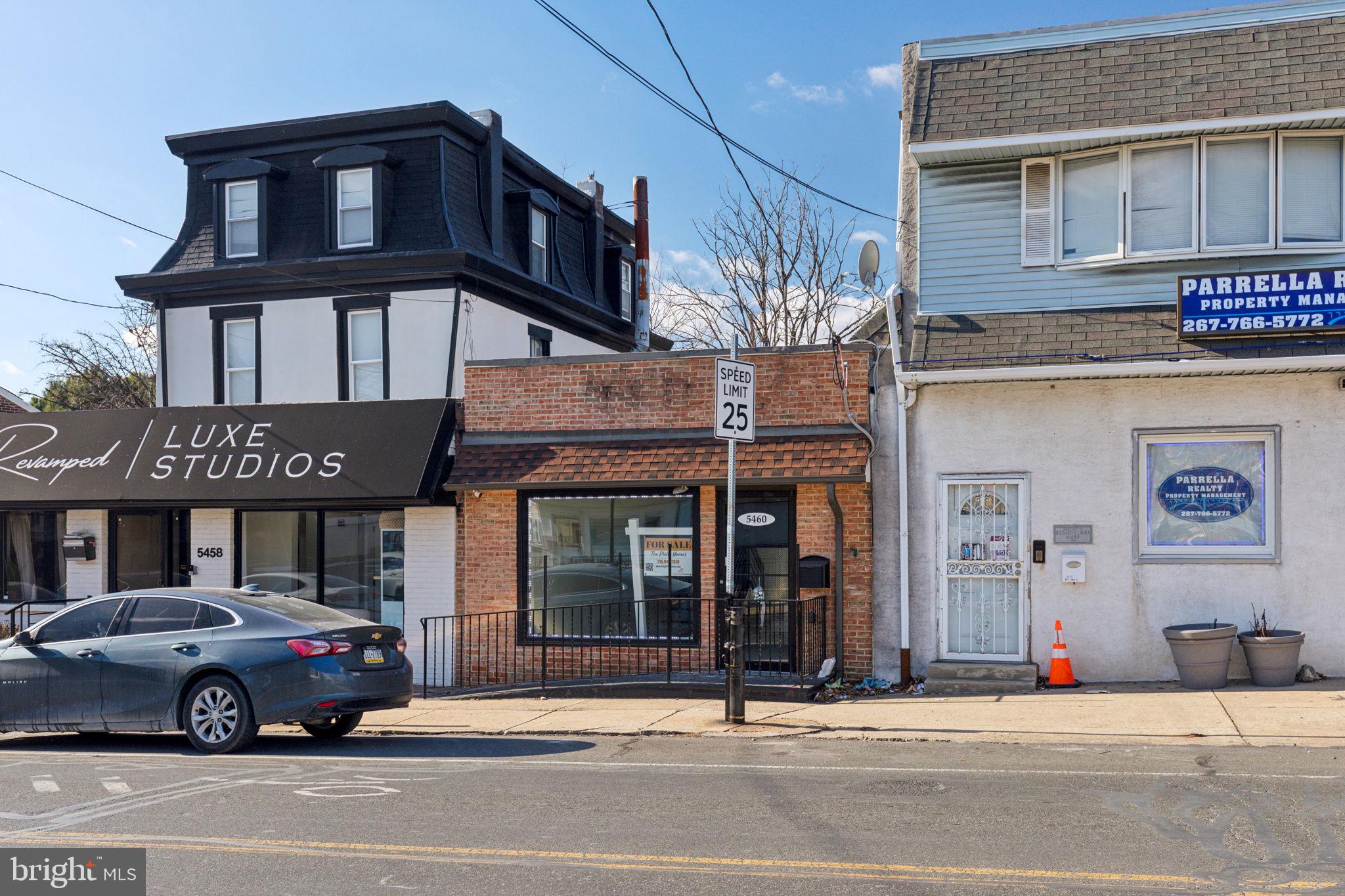 5460 Ridge Avenue Philadelphia, PA 19128 - Photo 4 of 26 a car parked in front of a building