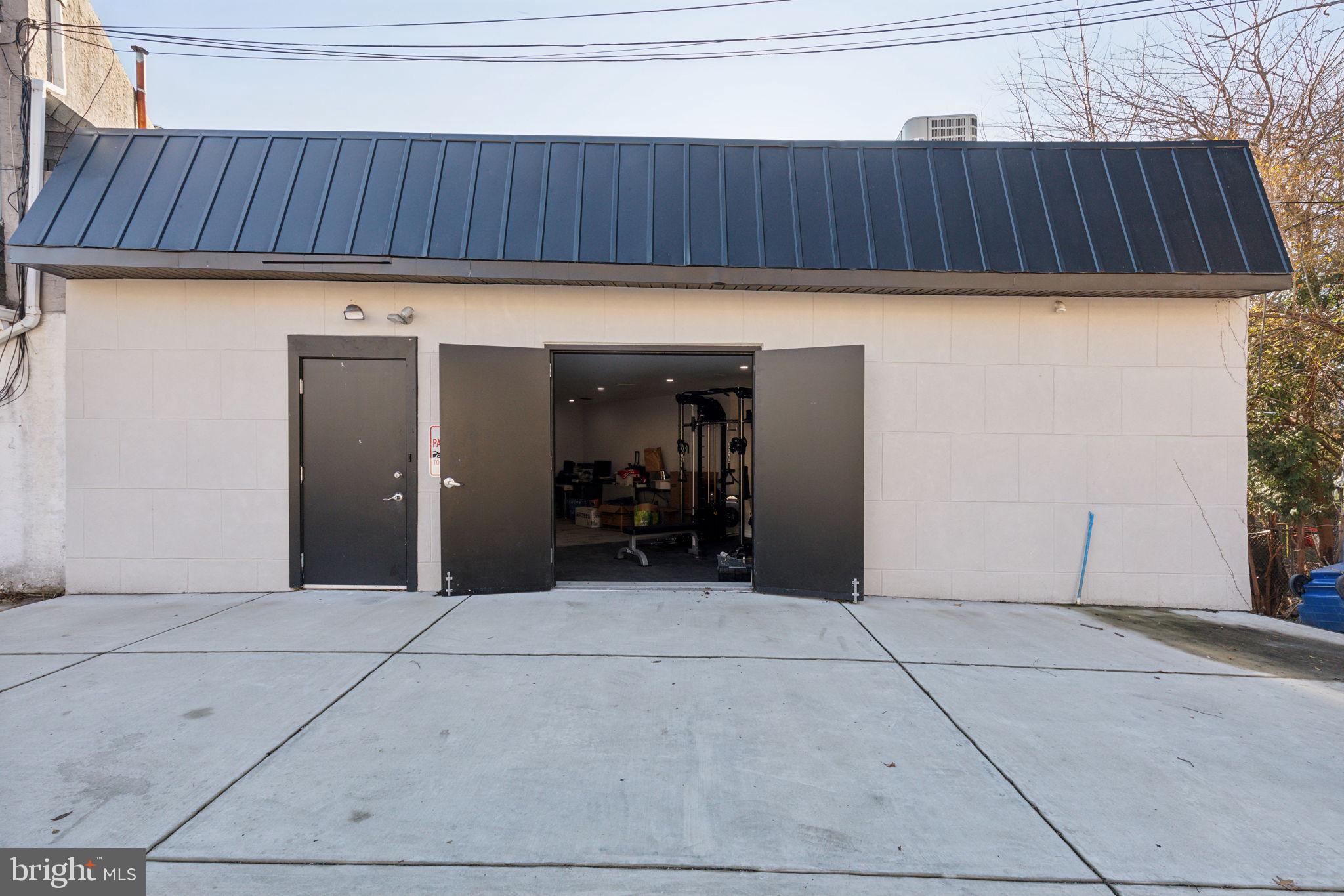 5460 Ridge Avenue Philadelphia, PA 19128 - Photo 5 of 26 a view of a entrance gate of the house