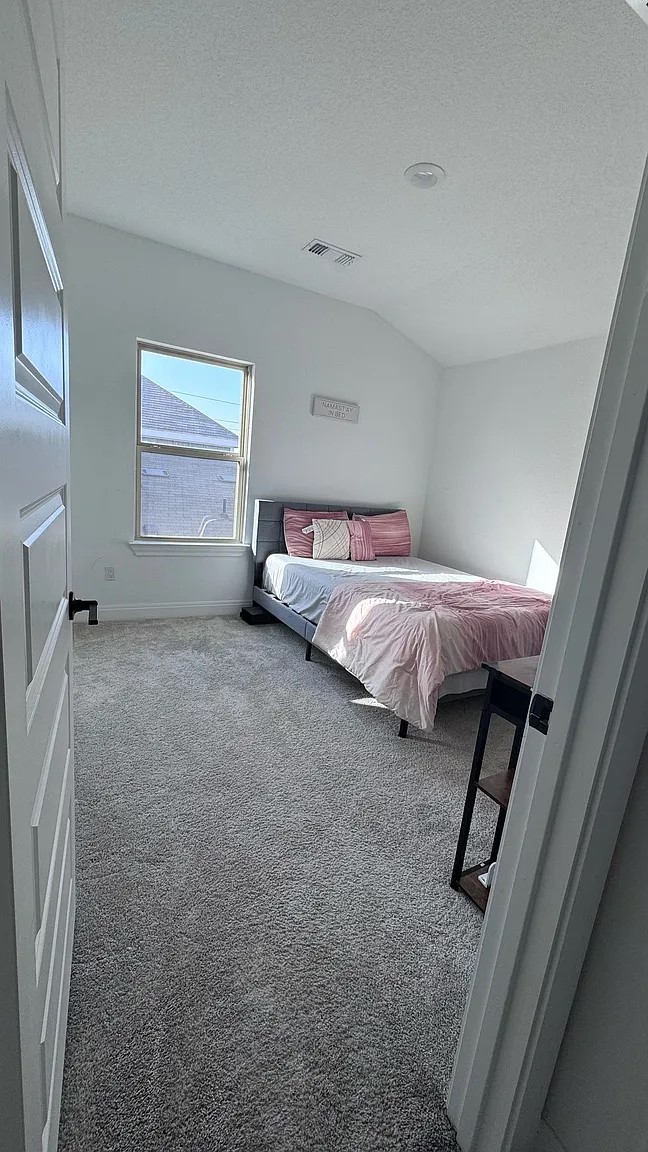 126 Georgia Lace Trail Georgetown, TX 78626 - Photo 22 of 32 a bed room with a bed and a window